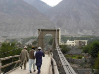 Suspension Bridge at Gilgit. You step fro solid ground onto a swaying bridge. Quite an experience.
