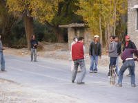 Playing cricket on the Karakorum Highway, shows how much traffic is expected!