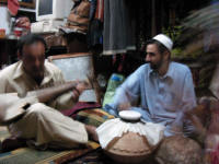 Listening to the Rabab (stringed instrument) and the abla (drum)