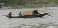 Fishermen on the river. Can;t be that bad if fixh survive