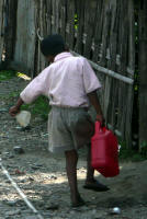 Young boy fetching water (Jay)