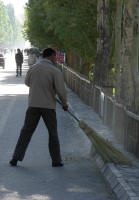 A street sweeper - unusual after Pakistan and India