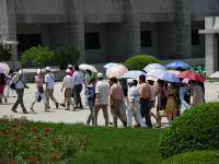 Chinese tourists and the ever present umbrellas