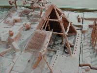 Model of square hut