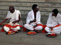 Priests preparing string for pilgrims, Mysore, India